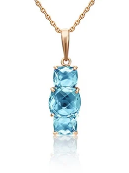 

Yuz platinum pendant with Topaz in red gold