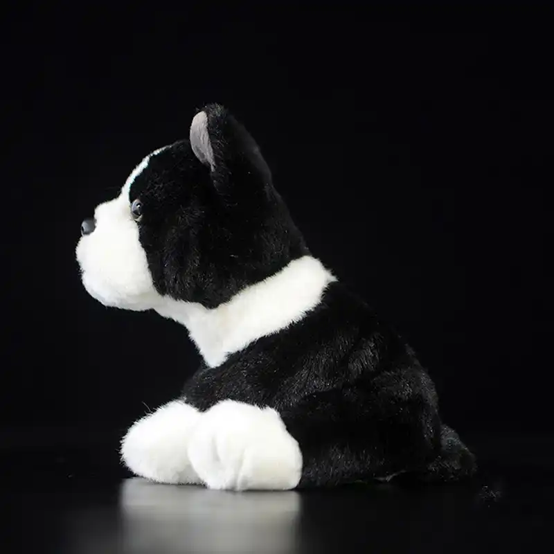 peluche perro blanco y negro