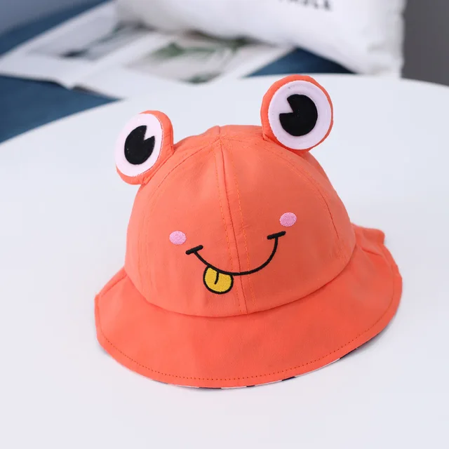 orange bucket hat with eyes
