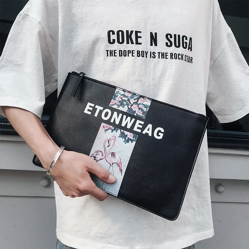 

New fashion leather trendy men's hand bag simple men's and women's small bag