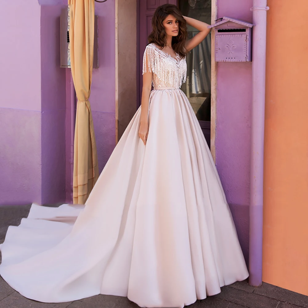 Eightree A-lijn Trouwjurken 2020 Boho Luxe Kralen Applicaties Satin Wedding Gown Kwastje Vestido De Noiva V-hals Bridal Dress Eightree A-lijn Trouwjurken 2020 Boho Luxe Kralen Applicaties Satin Wedding Gown Kwastje Vestido De Noiva V-hals Bridal Dress