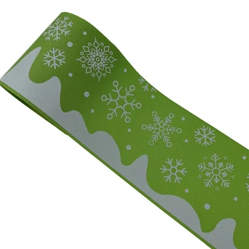 

Hot sell 3 inch (75mm) glow in the dark snowflower printed with green ribbon color Christmas ribbon accept customized order