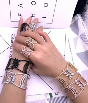

Dazz Fashion Luxury Cubic Zirconia Hollow Out Flower Rings Bangle Jewelry Set for Women Party Wedding CZ Aretes de Mujer Modern