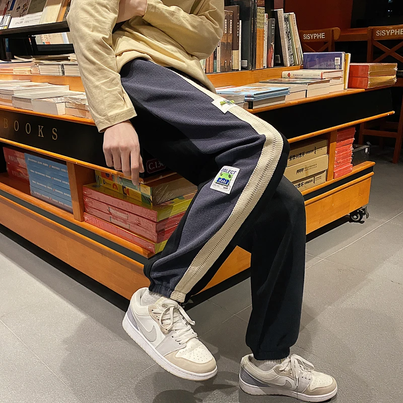 

2022 spring new label waffle guard pants men's tie-foot pants Hong Kong style stitching sports pants