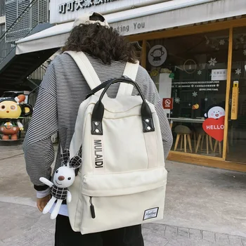 

2020 new simple girl schoolbag female junior high school student campus backpack canvas backpack trendy backpack Letter Canvas