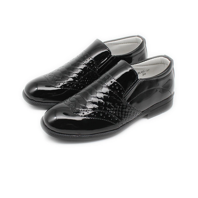 boys black brogues