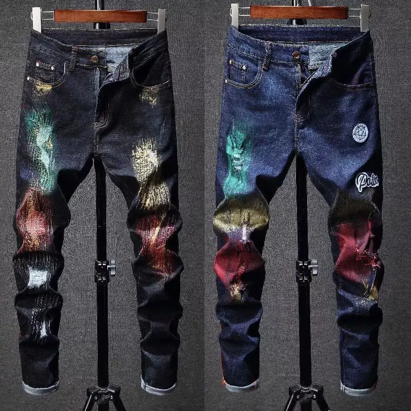 

2018 new men's color personality fashion brand broken hole jeans young men's elastic paint splash ink beggar pants