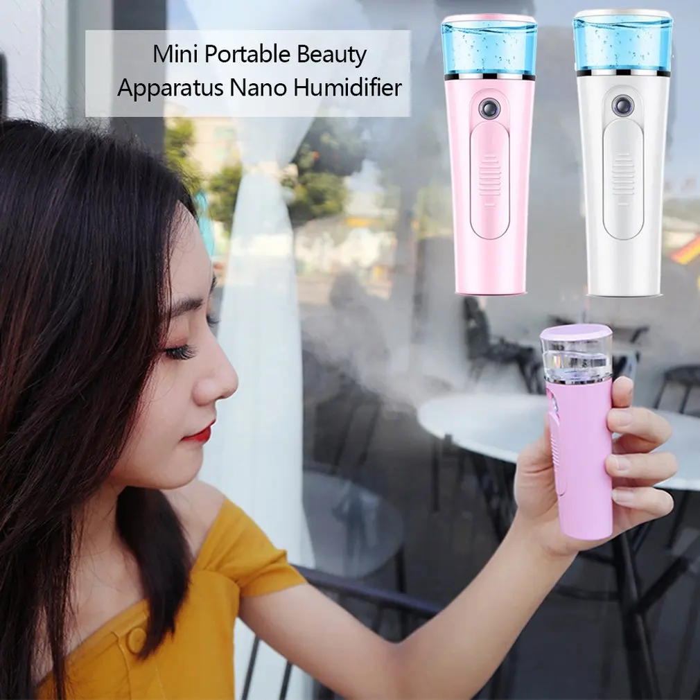 

Handheld Mini Portable Beauty Apparatus Nano Humidifier Charging Mini Steamed Face Humidifier Portable Size