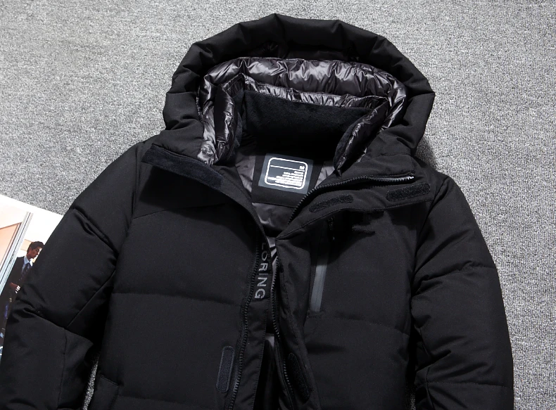 Новая качественная зимняя куртка на утином пуху, мужская мода, Повседневная Мужская Утепленная верхняя одежда с капюшоном, удлиненное черное пальто, 3XL пуховая парка для мужчин