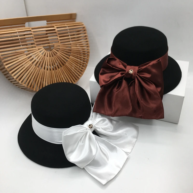 

The new wool Big bowknot fisherman basin cap aristocratic ladies fashion han edition hat bucket hats