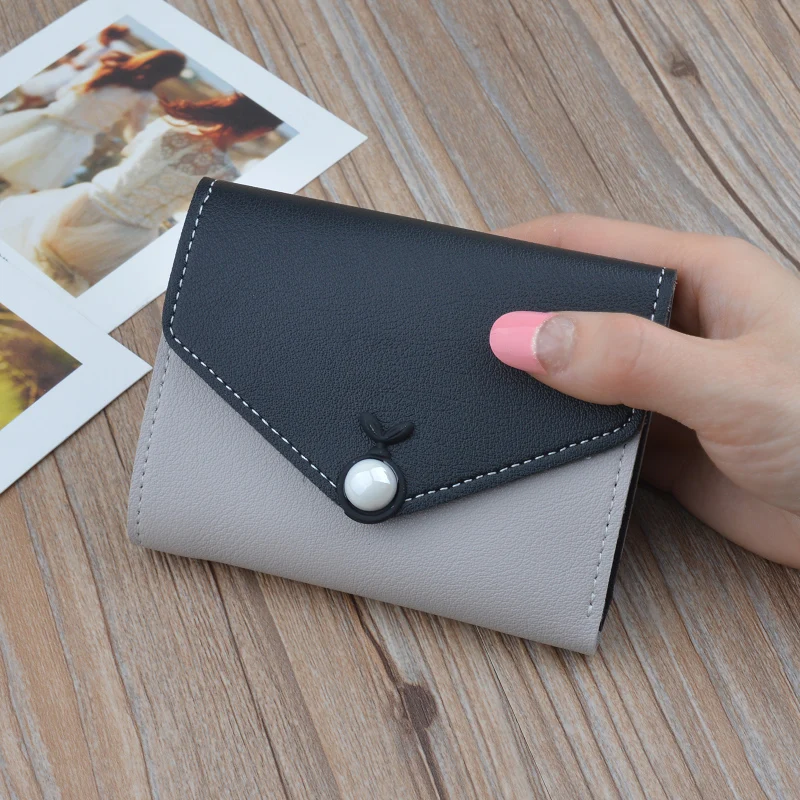 

New women's short wallet Korean three-fold clamshell female hit color student coin purse cute pearl small wallet