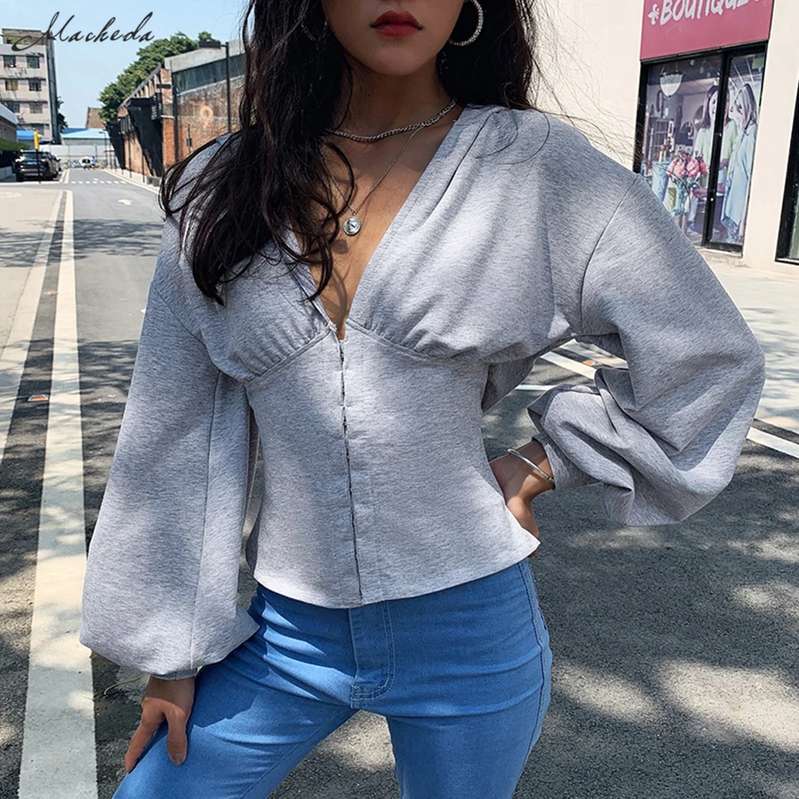 high waisted jeans with long sleeve shirt