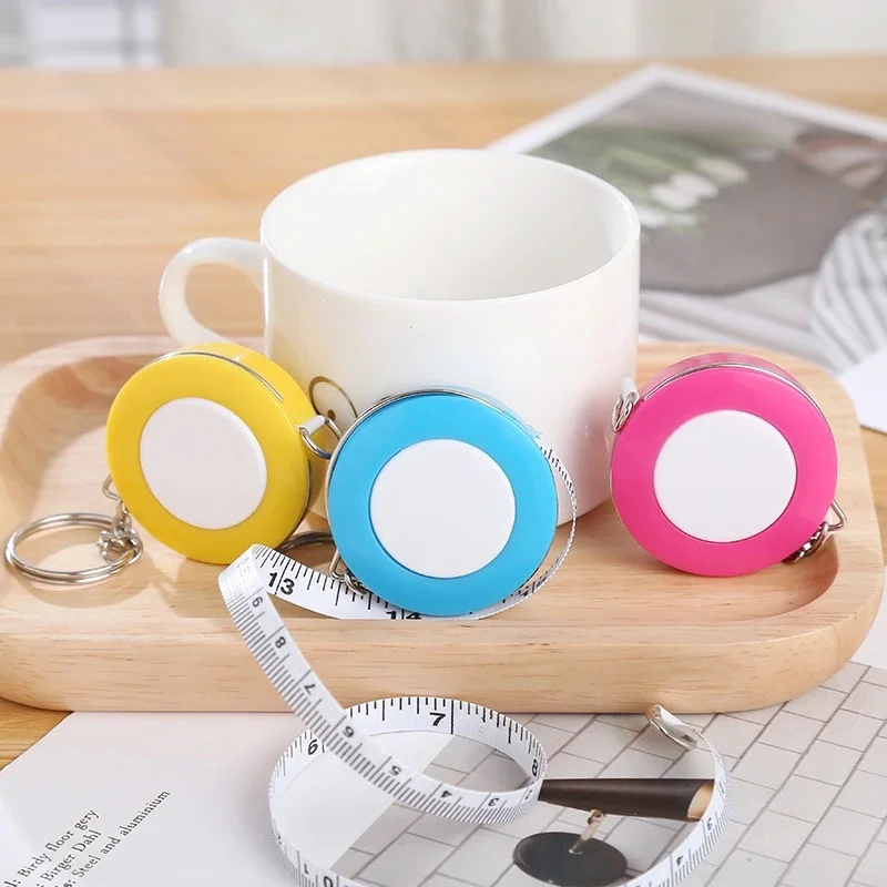 Description Picture 4 of item1PCS 150cm/60" Tape Measures Portable Retractable Ruler Mini Candy Color keychain Children Ruler Centimeter Inch Roll Tape