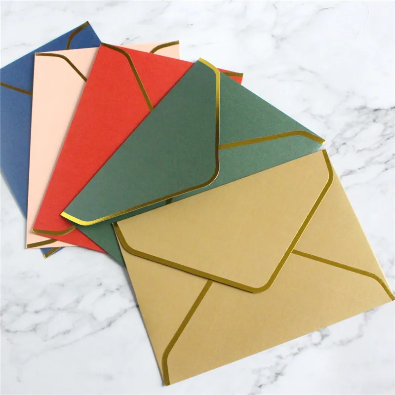 

Top quality invitation envelop 5.7"x7.9" pearl paper metallic gold border gold foil available.