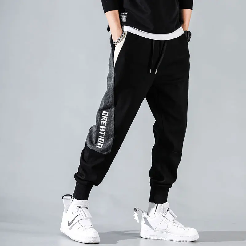 Reviews Fashion Streetwear Men Jeans Loose Fit Spliced Designer Casual Sweatpants Men Knitted Hip Hop Pants Men Joggers Pants Hombre