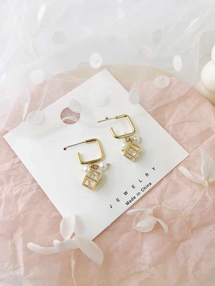 

STE03 925 Silver Needle Pearl Ear Nail Simple Female Compact Temperament Korean Personality Small Ear Drops Delicate Earrings
