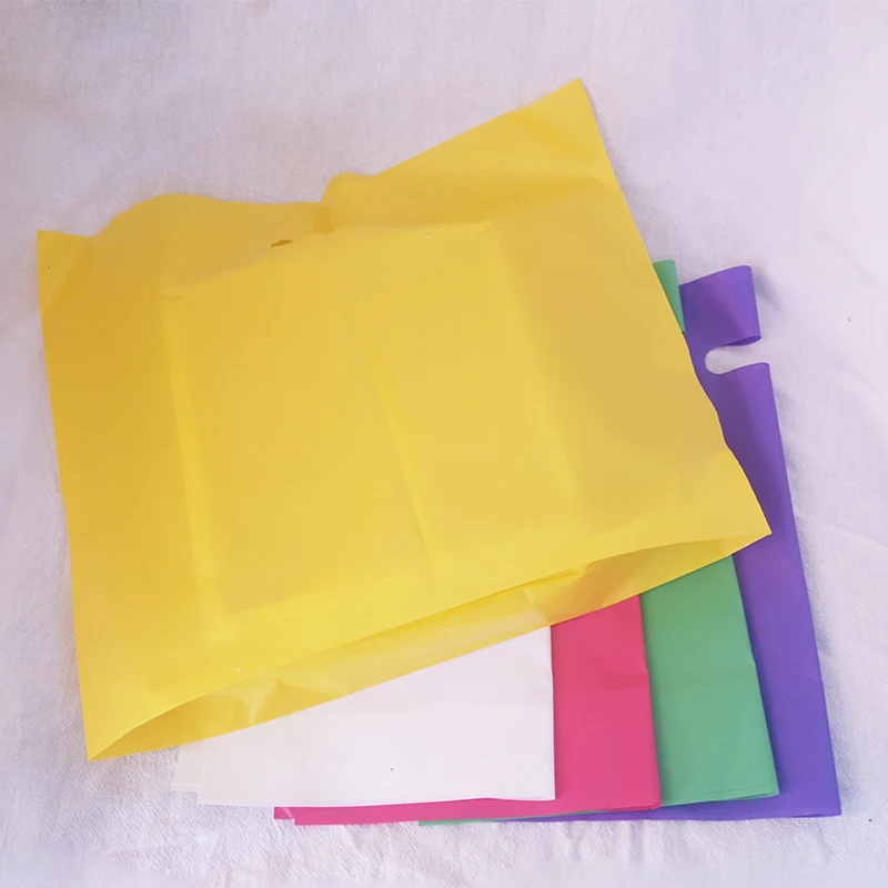 

100pcs Plastic Shopping Bag And Packaging bag Small large Plastic Bag Purple Color Jewelry Boutique Gift Bag With Handle