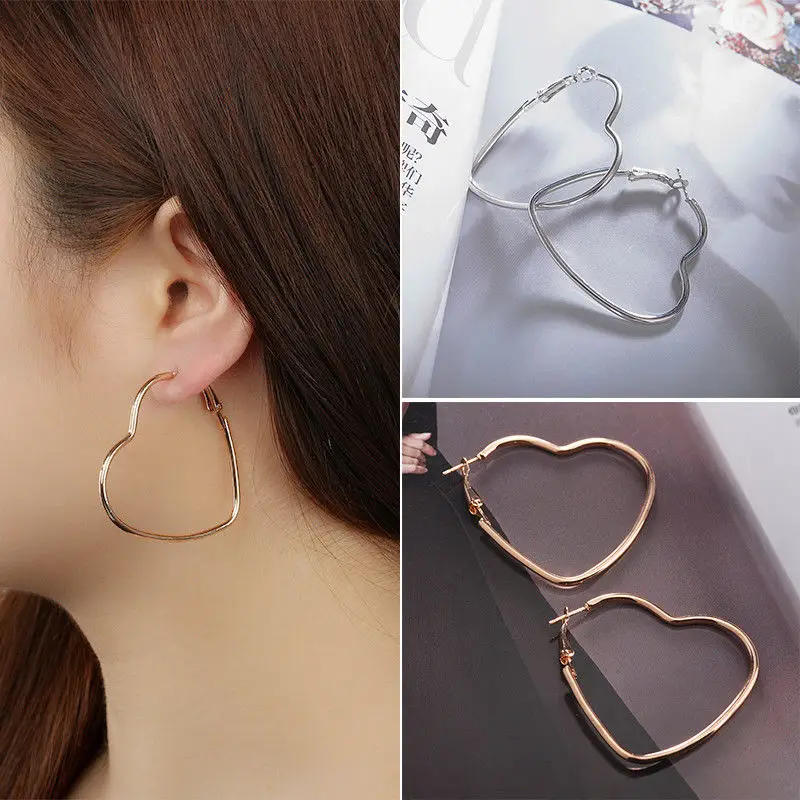 

Sweet Temperament Heart Shape Drop Earrings For Women Abstract Hollow out Statement Hand Metal Fashion Dangle Earring Jewelry