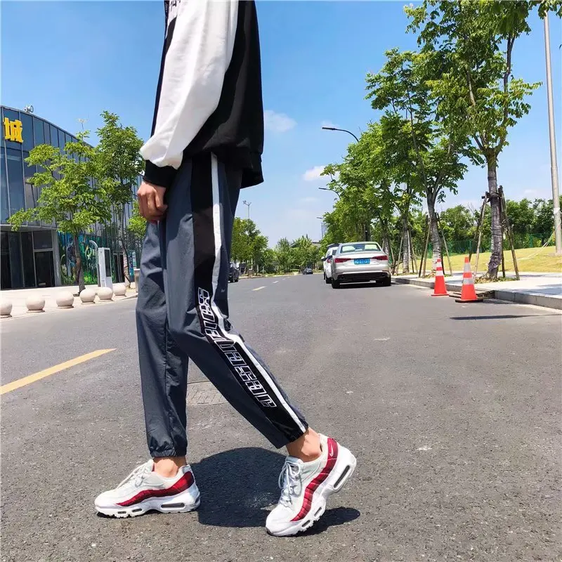 

Autumn Popular Brand Capri Athletic Pants Men's Stripes Hip Hop Closing Ankle Banded Pants Loose Thin Casual Harem Pants Trend