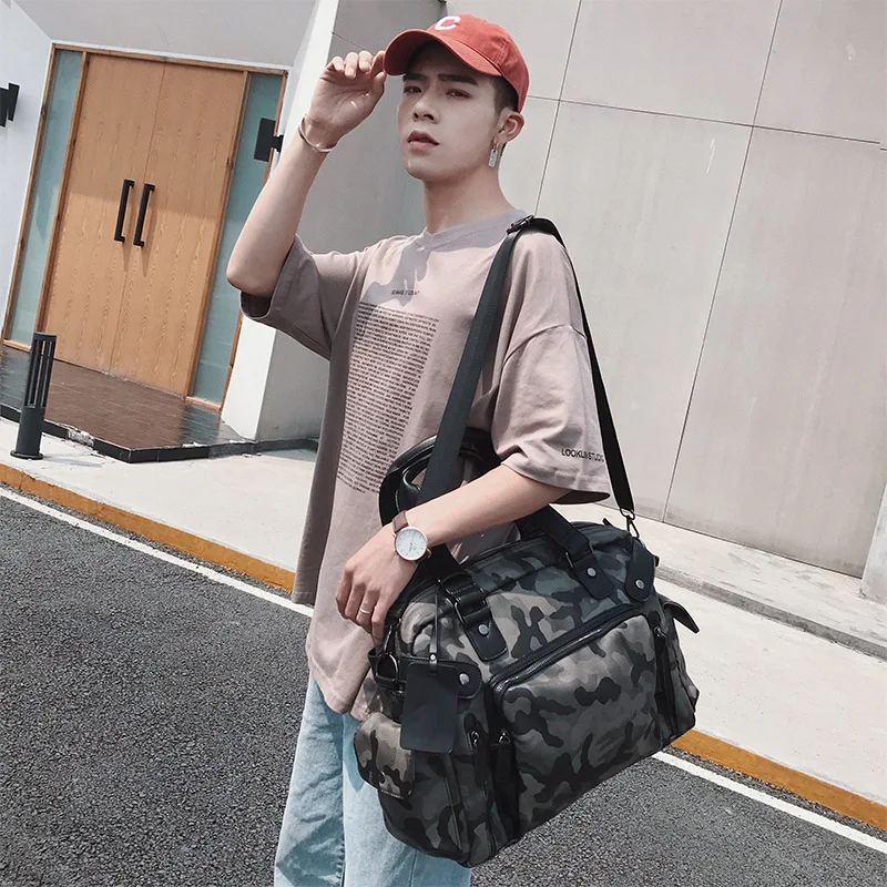 

The new Korean version of men's handbags trendy men's camouflage handbag travel bag casual fashion shoulder diagonal bag bag