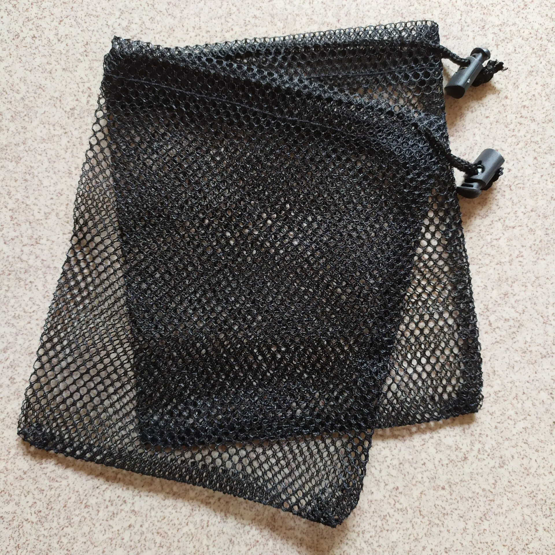 black mesh drawstring bag