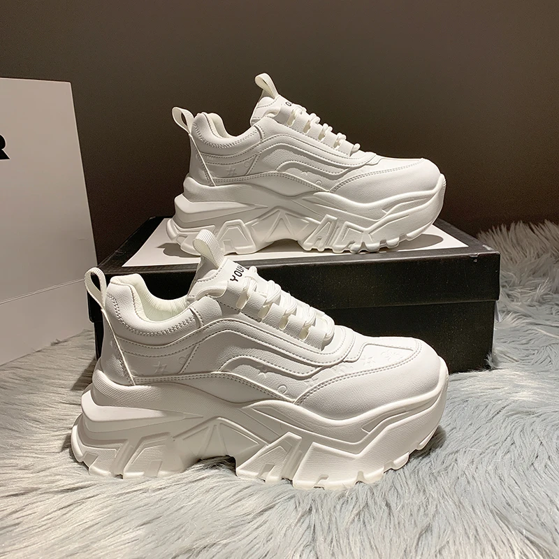 womens white branded trainers