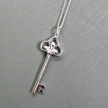 

Women's S925 Sterling Silver Classic Hollow Phoenix Heart Key with Zircon Pendant Necklace Sweater Chain