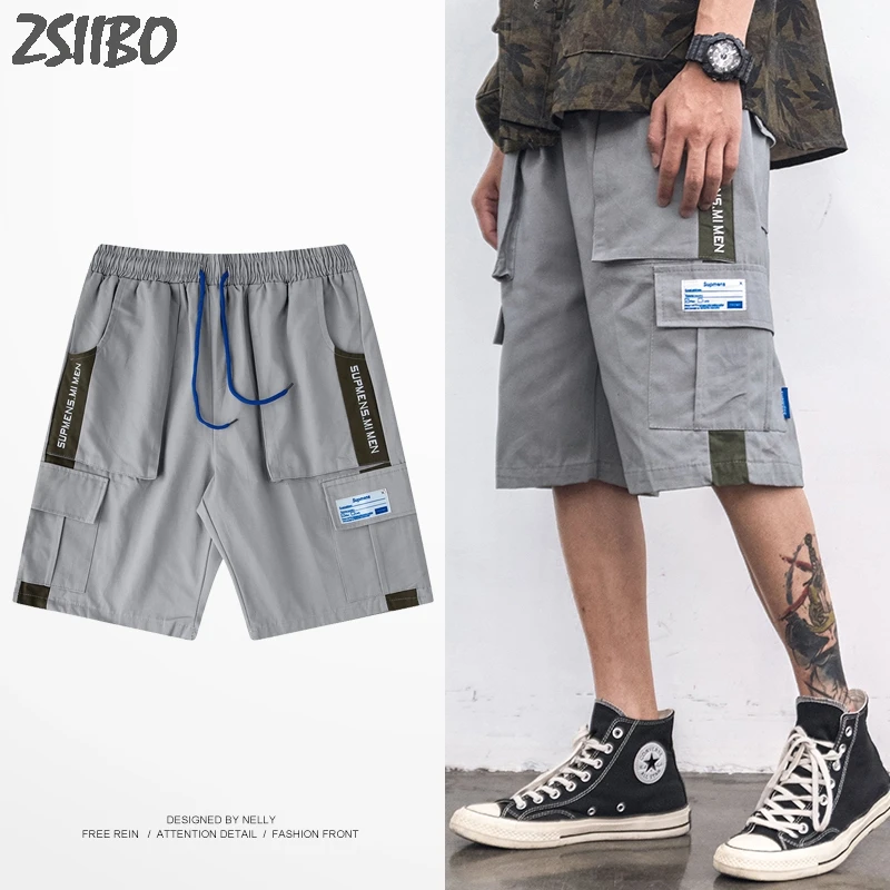 Harajuku New Men's shorts Loose Pocket tooling stitching embroidery trend Hip Hop loose sports five points pants Male Streetwear