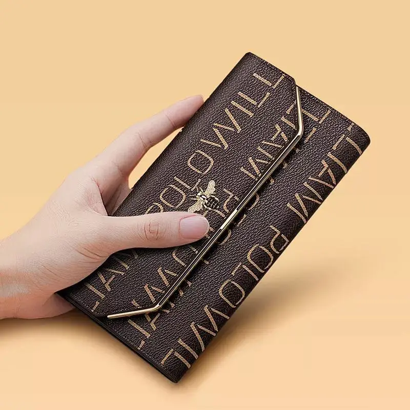 2020 new leather women's wallet long fashion three fold purse tassel Design Hand Purse small size large capacity women's purse 2020 new leather women's wallet long fashion three fold purse tassel Design Hand Purse small size large capacity women's purse