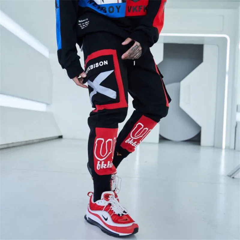 

2020 new street fashion brand color-blocking letter printing reflective overalls men's hip-hop hip-hop harem pants