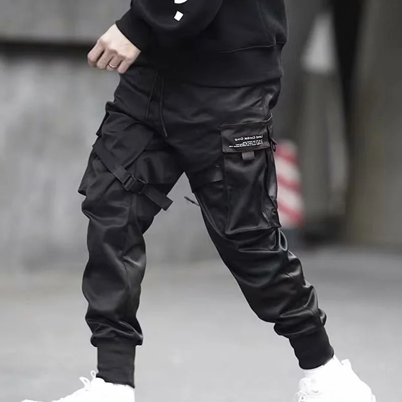 Недавно Для мужчин брюки карго ленты шаровары, штаны для бега Harajuku спортивные штаны в стиле хип-хоп брюки DO99