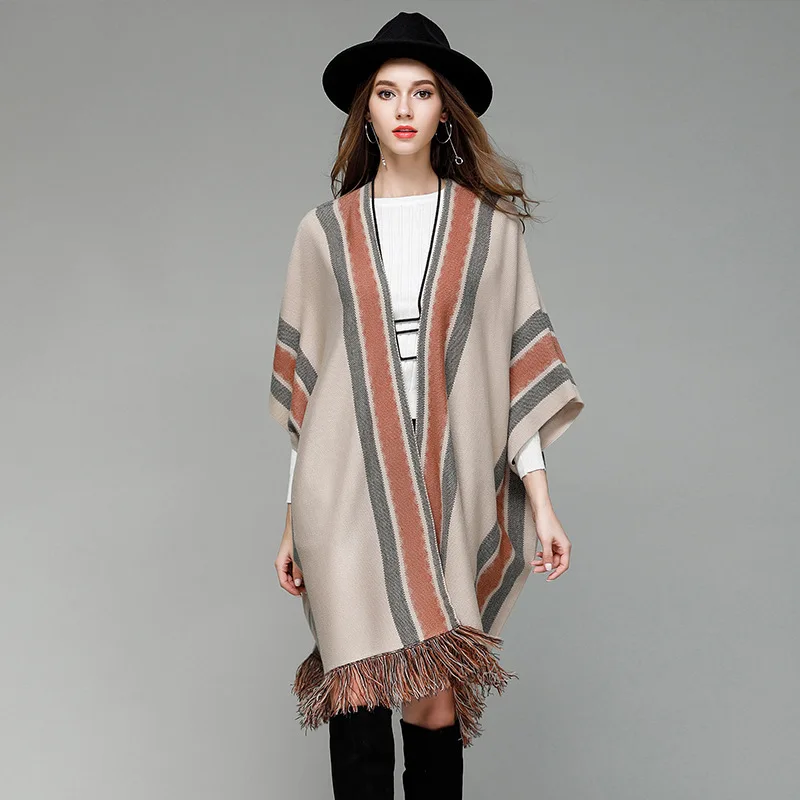 

Russia Free shipping Mid-long knitted sweaters with fringed shawl sleeves popular in autumn and winter in Europe and American