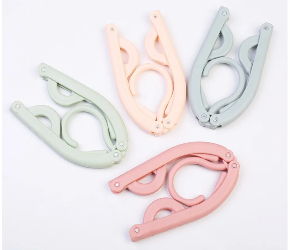 

4 PCS/Set Plastic Coat Hanger Home and Travel Use Foldable Multi-functional hangers for clothes Out door Plastic Drying Rack