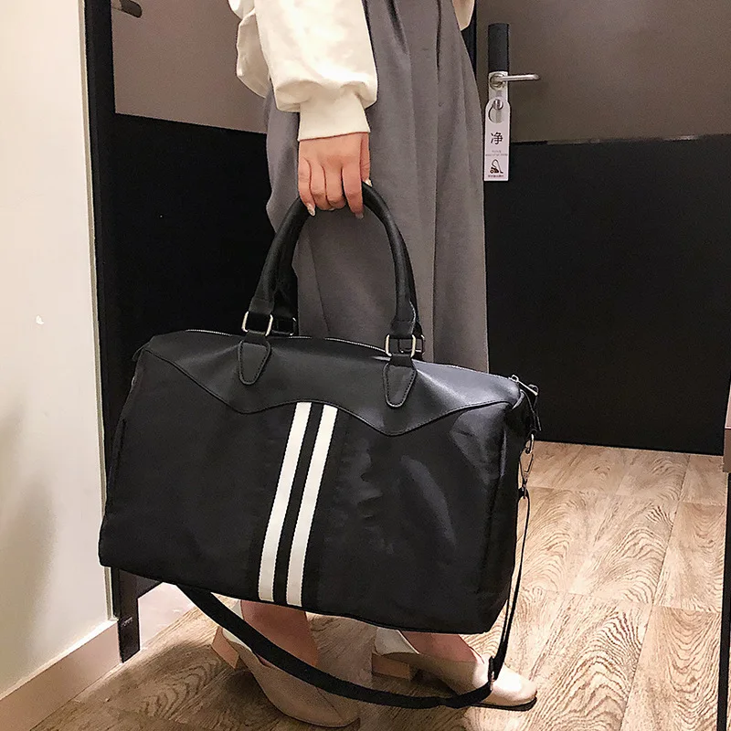 

The new tide version of the sports bag large capacity portable fitness bag waterproof outdoor sports bag for women