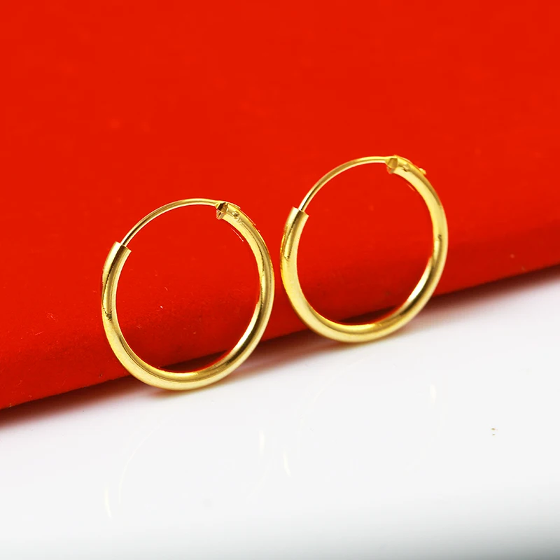 Элегантные красивые серьги-кольца из желтого золота диаметром 2 см для девушек и