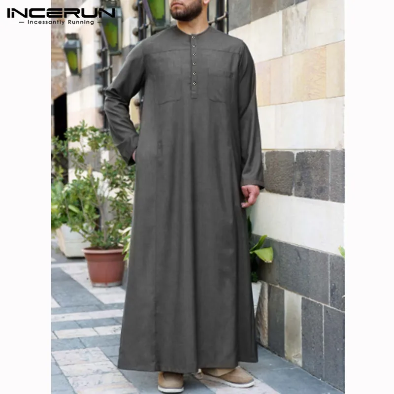 

INCERUN Men Jubba Thobe Muslim Islamic Kaftan Solid Long Sleeve Pockets Robes Vintage Saudi Arabia Middle East Men Thobes Abaya