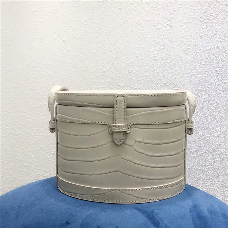

Xiaozhong Design Crocodile Grain Cowhide Round Box Flip Cover Bolt Small Bucket Bag Single Shoulder Satchel