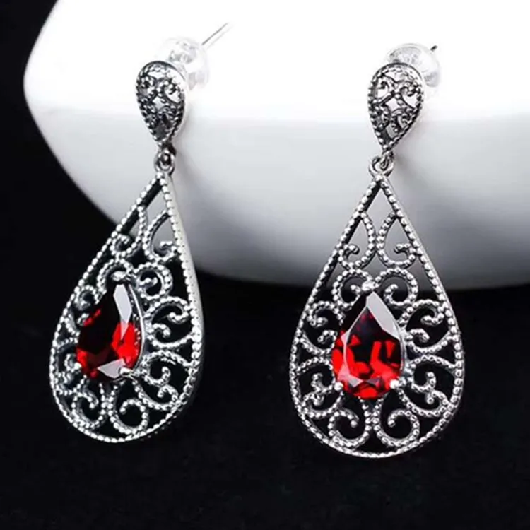 

925 Silver Natural Mozambique Pigeon Blood Garnet Earrings Strobe Cutting Water Droplet + Comber Pattern Design