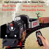 High Simulation Smoking Steam Spray 2.4G RC Steam Train Model With Sound Light Driving 666CM Track DIY Assembly Chimney Railway 1