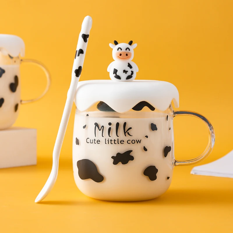 https://ae01.alicdn.com/kf/H1241ee6fd1c34ab7923a43d6ae5a92b1V/Cartoon-Milk-Cow-Glass-Mug-Clear-Coffee-Cup-With-Lid-Ceramic-Spoon-Cute-Home-Office-Tea.jpg