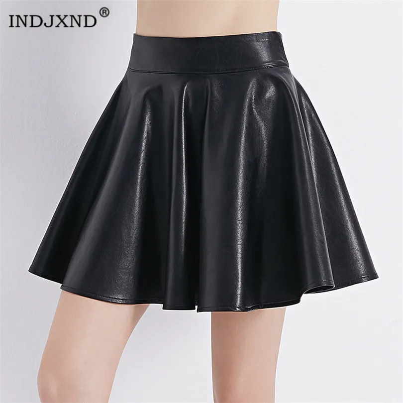 

INDJXND Women New Elastic High Waist Faux Leather Flare Skirt Casual PU Mini Skirt Above Knee Solid Color Black leather Skirt