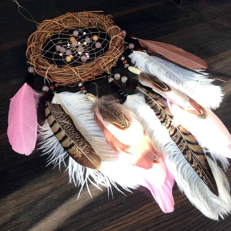 https://ae01.alicdn.com/kf/H1269431142f3436382bb60e4024b7918q/Rattan-Dream-Catcher-Turkey-Feathers-Natural-Stone-Beads-Knitted-Wall-Window-Decor-Wind-Chimes-Handmade.jpg