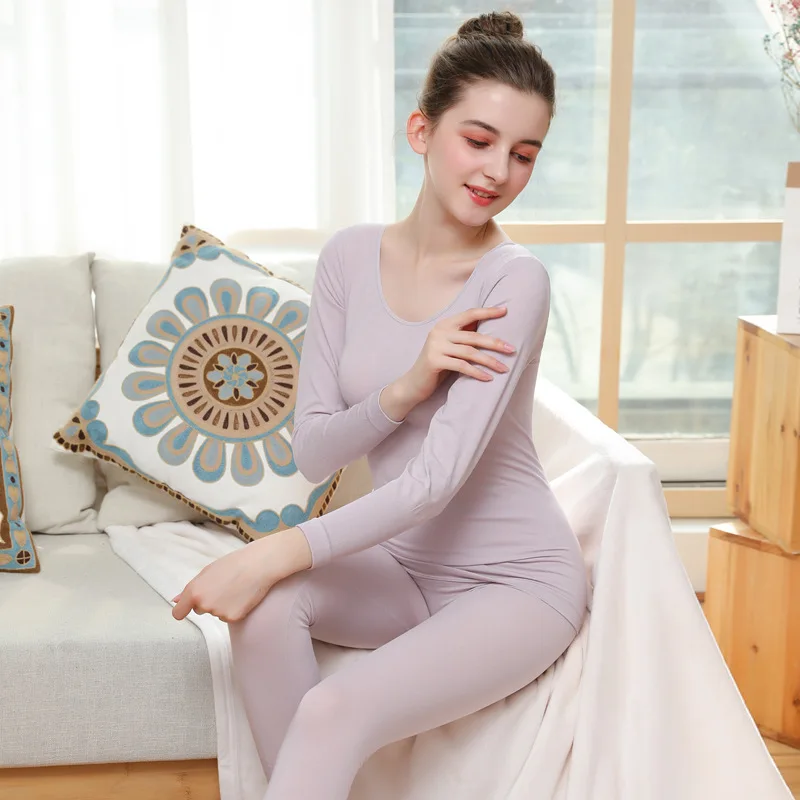Autumn and winter women's body shaping solid color round neck low collar thermal underwear set body autumn clothing long pants