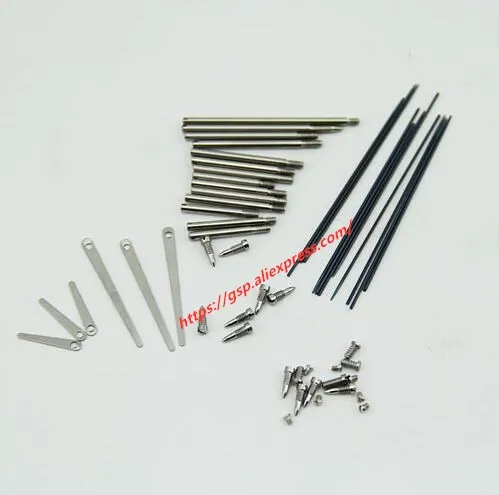 

A set of clarinet repair accessories, shaft rod screw through shaft reed needle spring