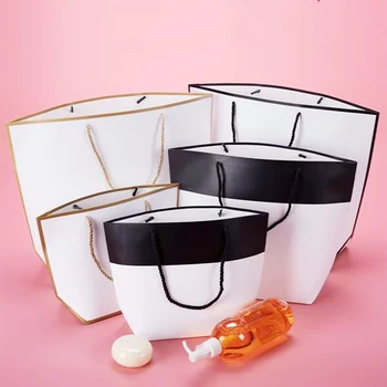 

10x Popular handbag Bags Kraft Paper Gift Bag Shop Packing boxes Clothes pajamas /wigs box Package Festival Christmas Party Bag