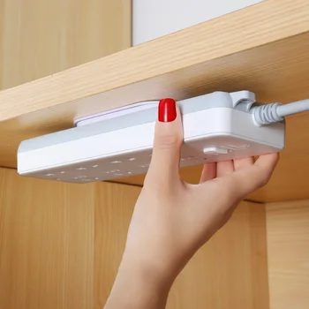 

Row plug holder wall-mounted wire seamless plug row line board wall sticker socket buckle router storage cable manager