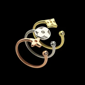

Hollow Four-leaf Flower Three-color Three-piece Ring 18K Gold Four Leaf Flower Open Ring