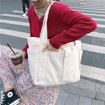 

Korean version of ins lazy wind multi-pocket canvas bag large capacity commuter single shoulder tote bag female student