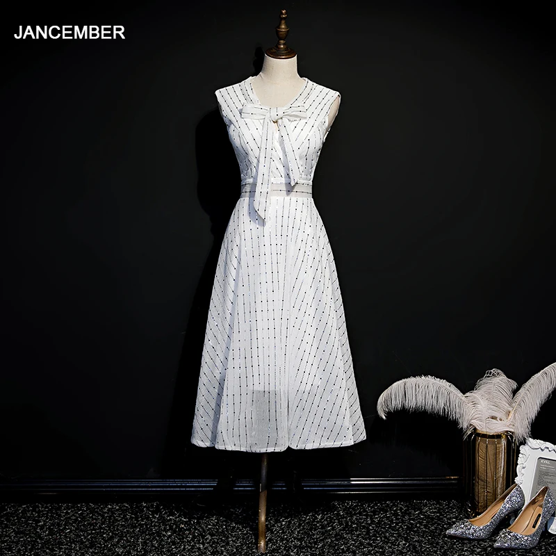 white sequin cocktail dress