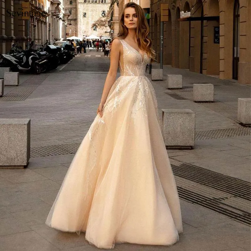 

Sevintage A Line Shinny Sequined Wedding Dresses Boho Sleeveless V-Neck Bridal Gowns Floor Length Bride Dress Robe De Mariee